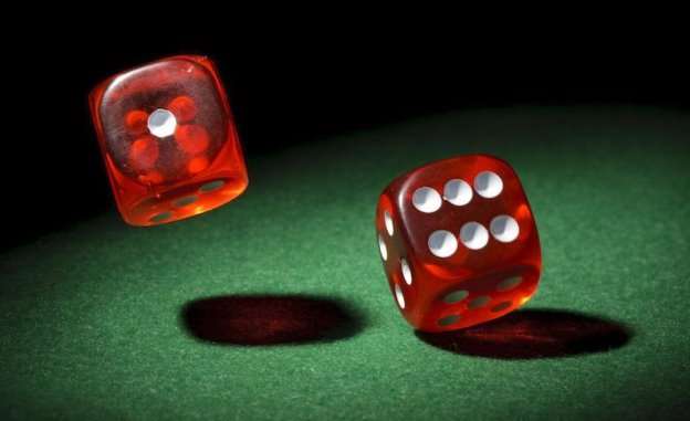 Centre of Mass Impact on Roll of Dice